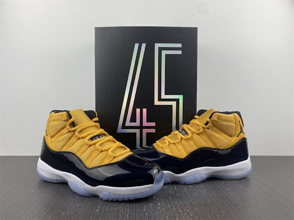 Air Jordan 11 Retro 'Black Yellow' - CHIC TREAD